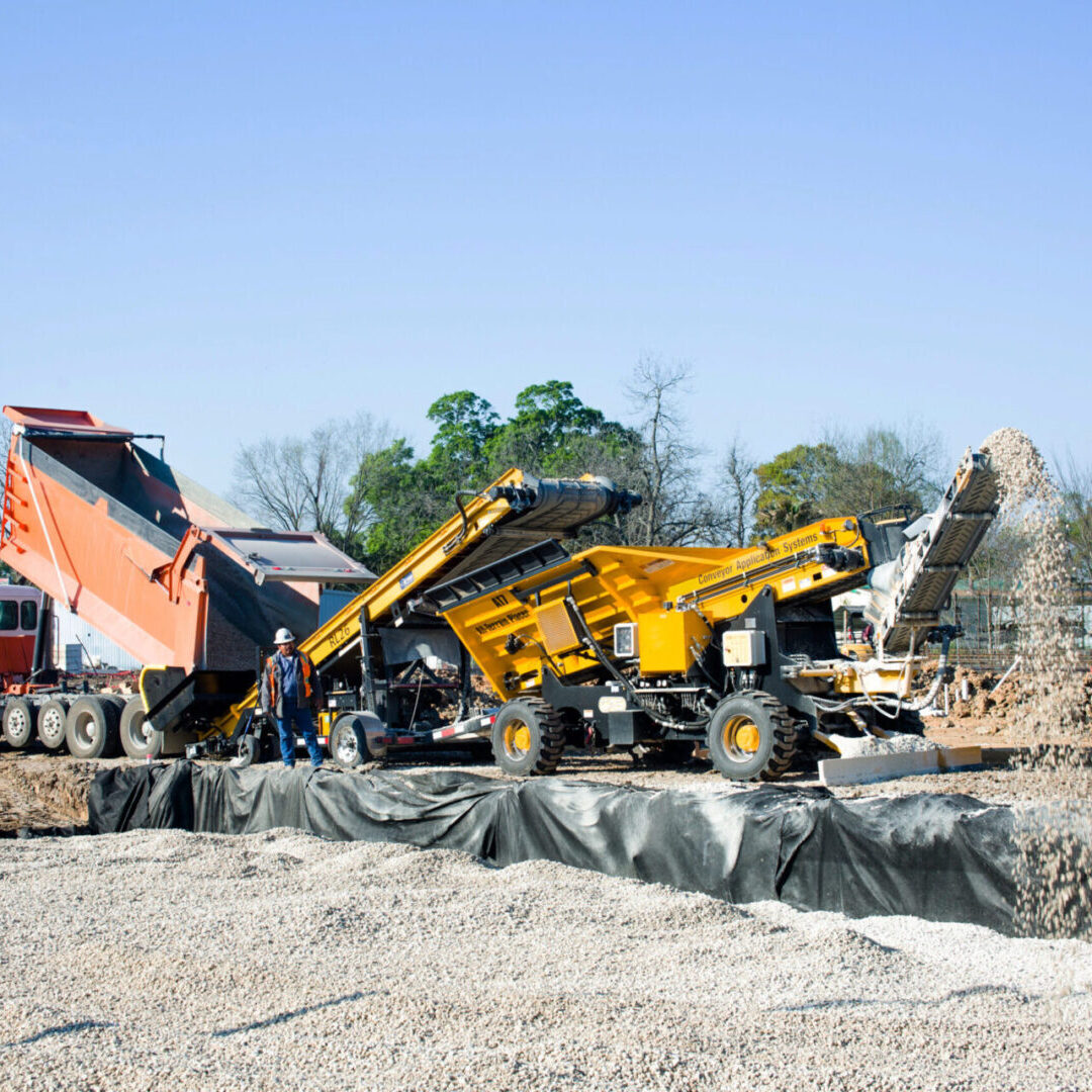 Rock Slinger backfilling aggregate and gravel